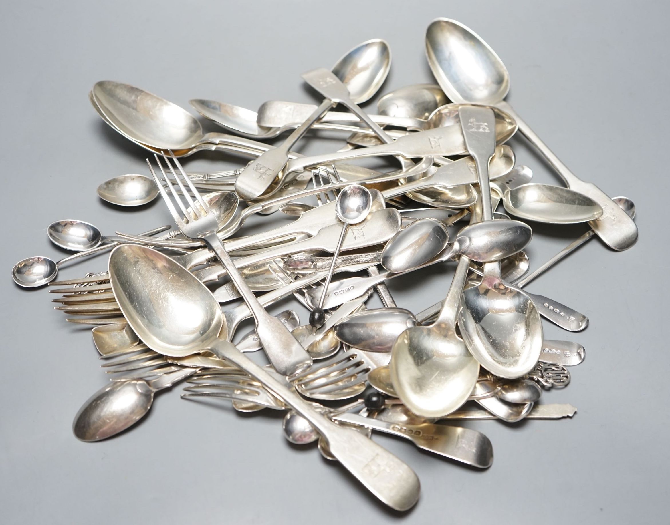 A set of six early Victorian Irish silver fiddle pattern table spoons, Philip Weekes, Dublin, 1844 and a quantity of assorted mainly 19th century flatware, various dates and makers